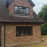 Black gutter & Rosewood fascia after 2