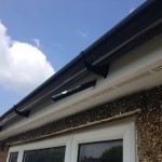 Fascia Vented Soffit & Black Round Gutter
