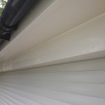Black Deepflow Gutter Fascia Above Garage Door, Under Soffit