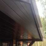 Black fascia on porch with black cladding and T&G