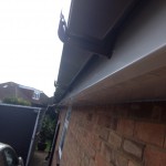 White Vented Soffit White Fascia and Brown Square Gutter