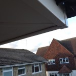 Cream Fascia, Soffit Round Black Gutter